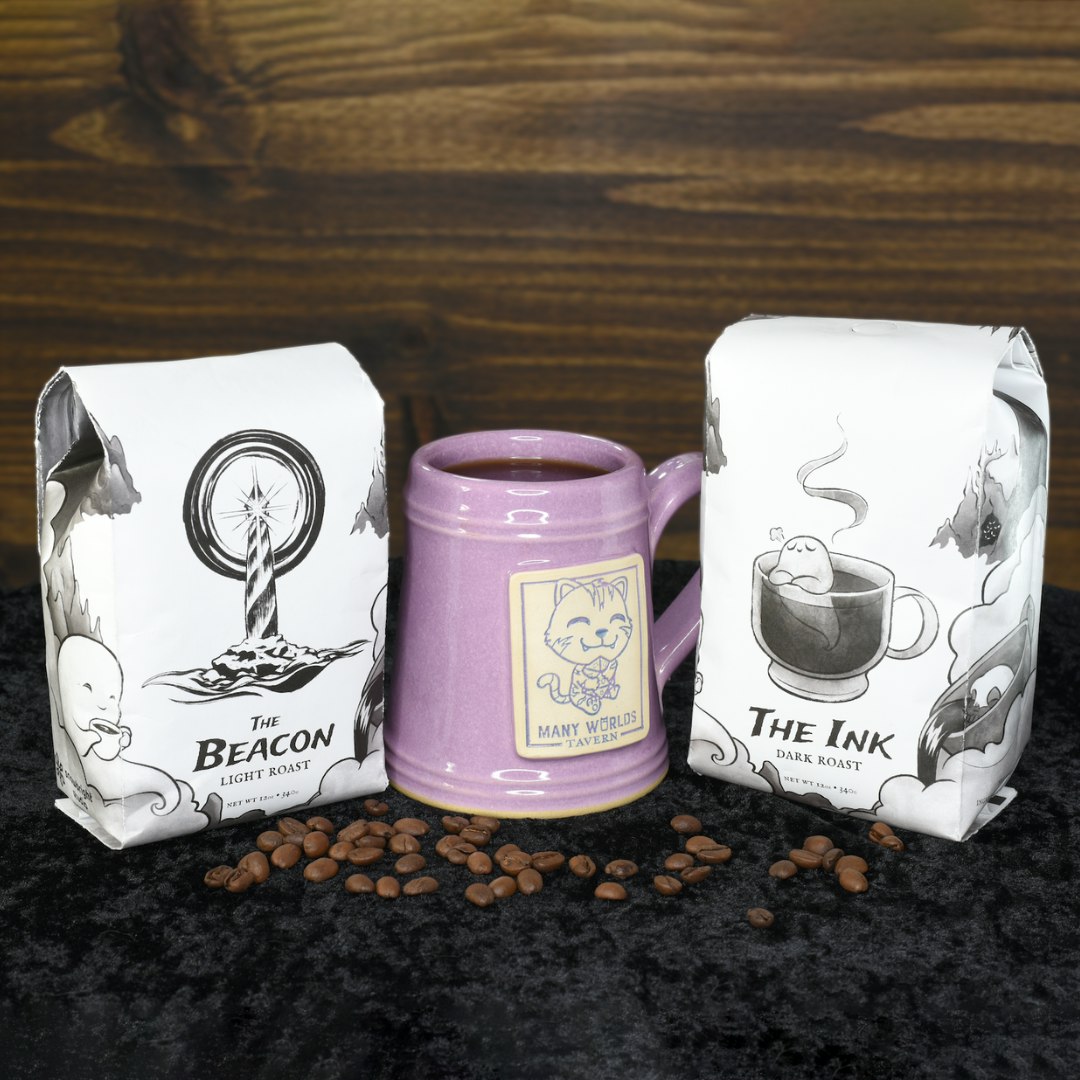 The Beacon and The Ink coffee bags with a Many Worlds Tavern coffee mug