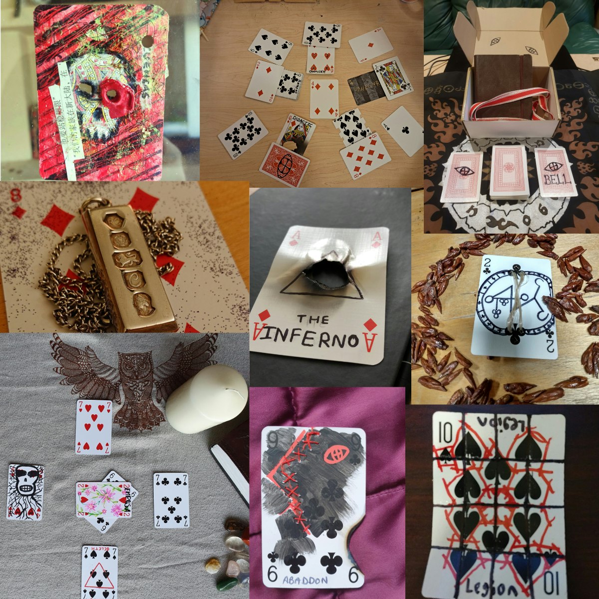 A collage of wrecked cards, with a mix of simple sharpie scrawlings and highly detailed art projects"