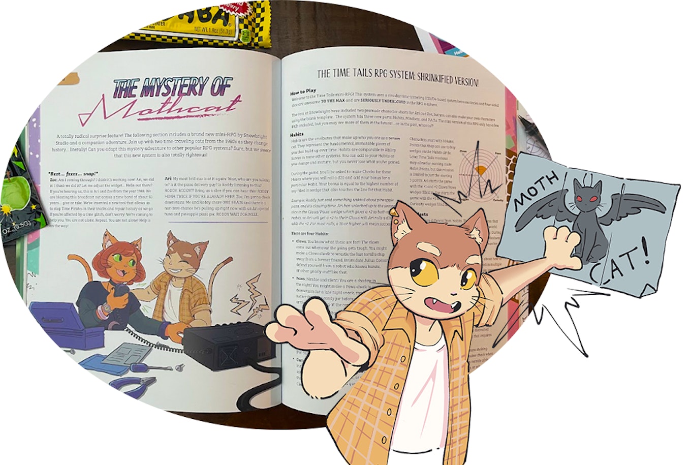 Photo of book and Ari with a Mothcat drawing