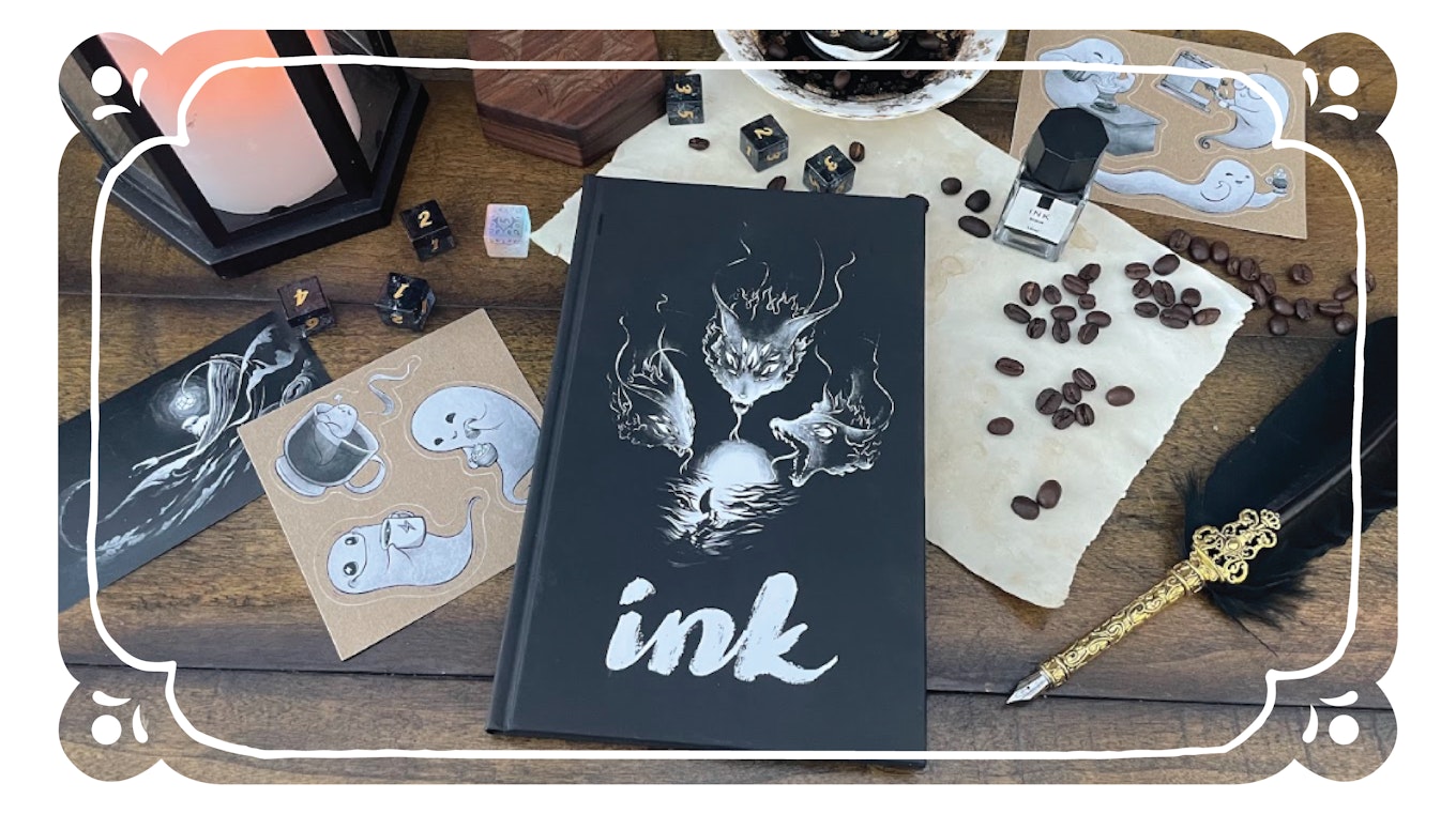 A copy of ink on. a table surrounded by coffee beans, stickers dice and a black quill