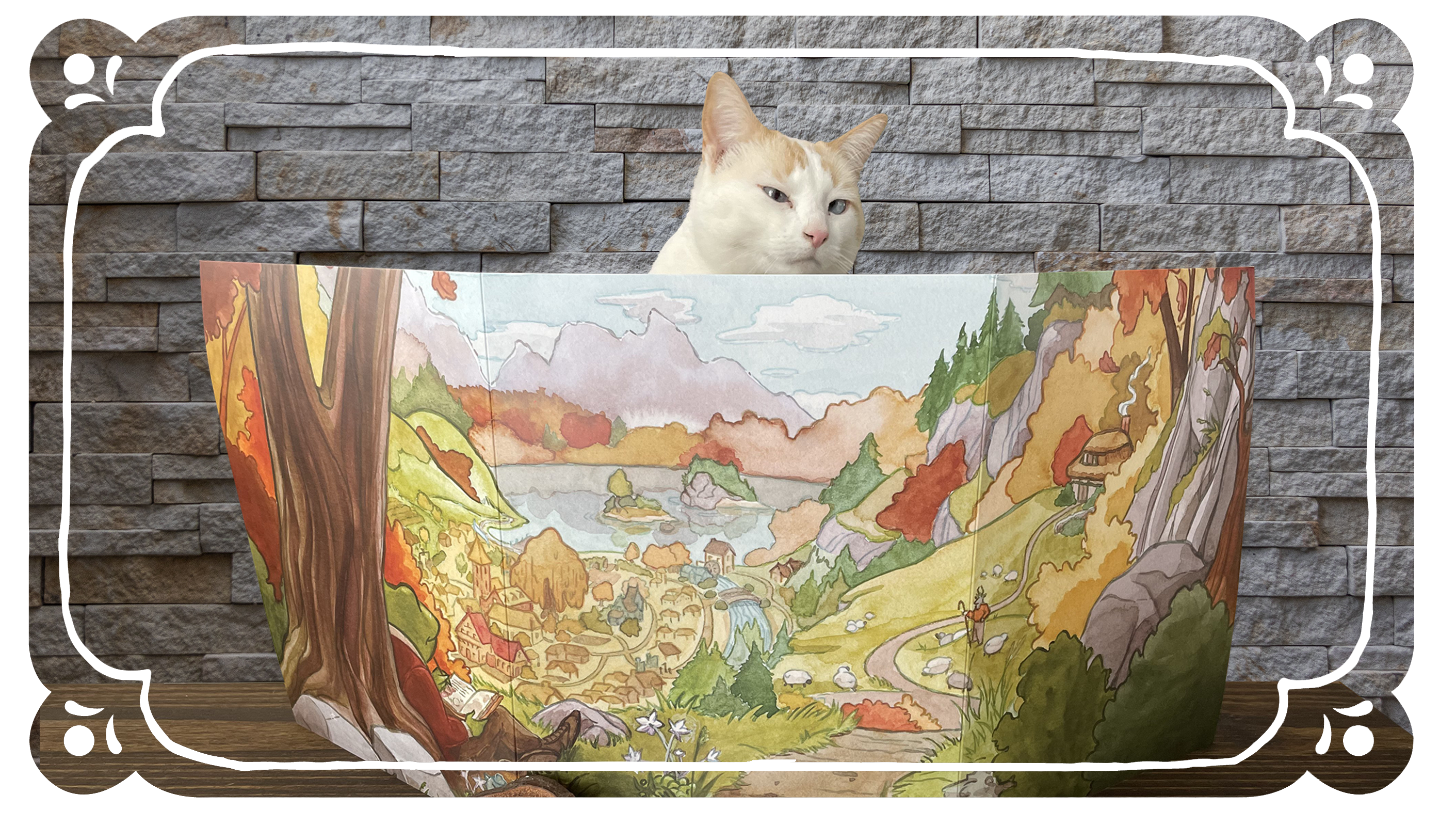 Gus the cat peering over the Teatime Adventures GM screen